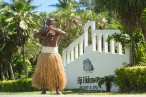 Family resort in Coral Coast Fiji with kids playing on the beach